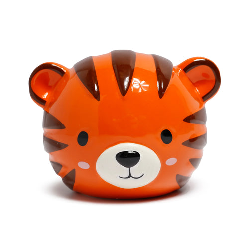 Front view of a ceramic tiger money box, coloured bright orange with dark brown stripes, black eyes, a black nose, a white muzzle, and pink cheek spots.