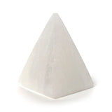 Front-angled view of a white crystal pyramid gemstone on a white background.