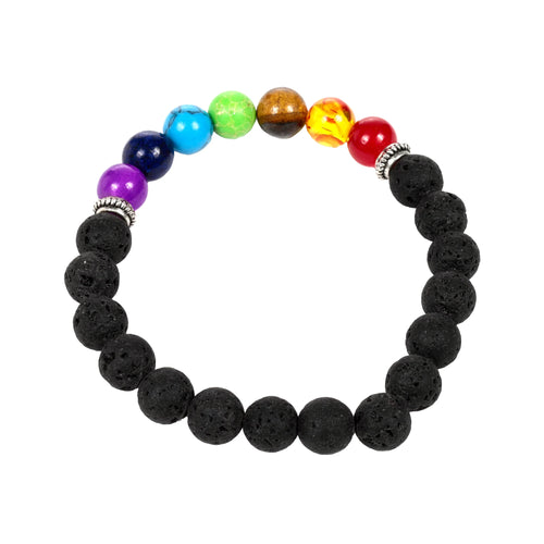Flat lay of a chakra lava rock bracelet. It features black, porous lava rock beads alongside a segment of seven smooth, brightly coloured gemstone beads in purple, dark blue, light blue, green, brown, orange, and red. Two ornate silver-coloured spacers flank the gemstone segment.