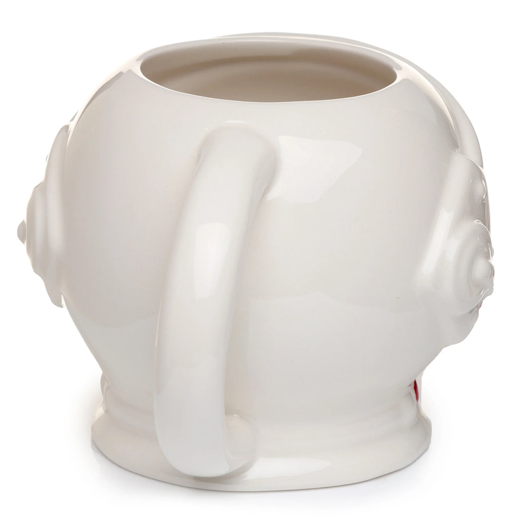 White ceramic astronaut space helmet mug, featuring its curved handle and the rounded rear of the helmet with moulded details.