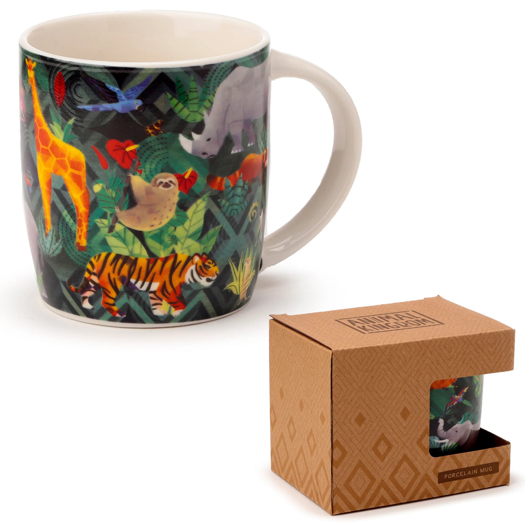 Angled view of a Porcelain Mug featuring a vibrant Animal Kingdom design with a tiger, giraffe, sloth, and rhinoceros amongst lush green jungle foliage, displayed next to its coordinating brown cardboard gift box showing an elephant detail.