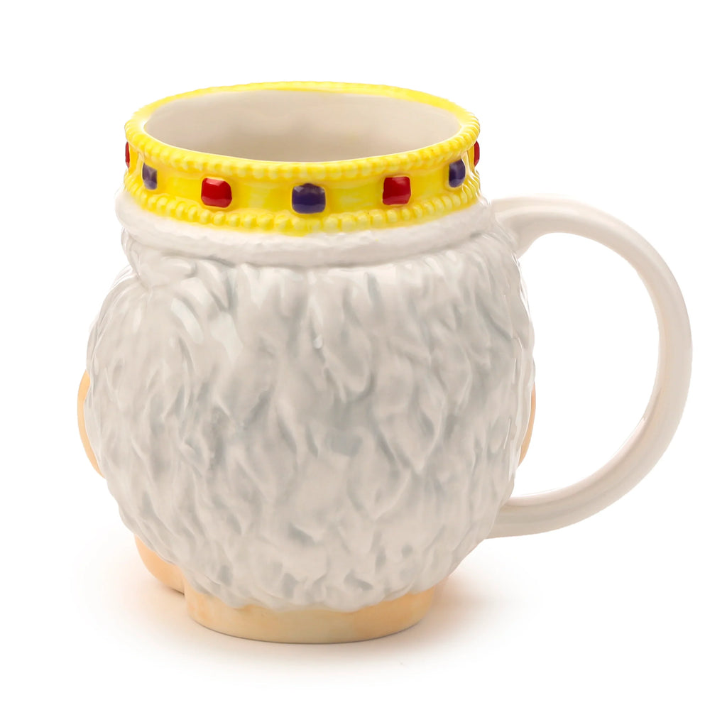 Angled rear view of a ceramic shaped head mug, featuring a textured white surface, a yellow crown-like rim with red and purple jewels, and a cream handle.