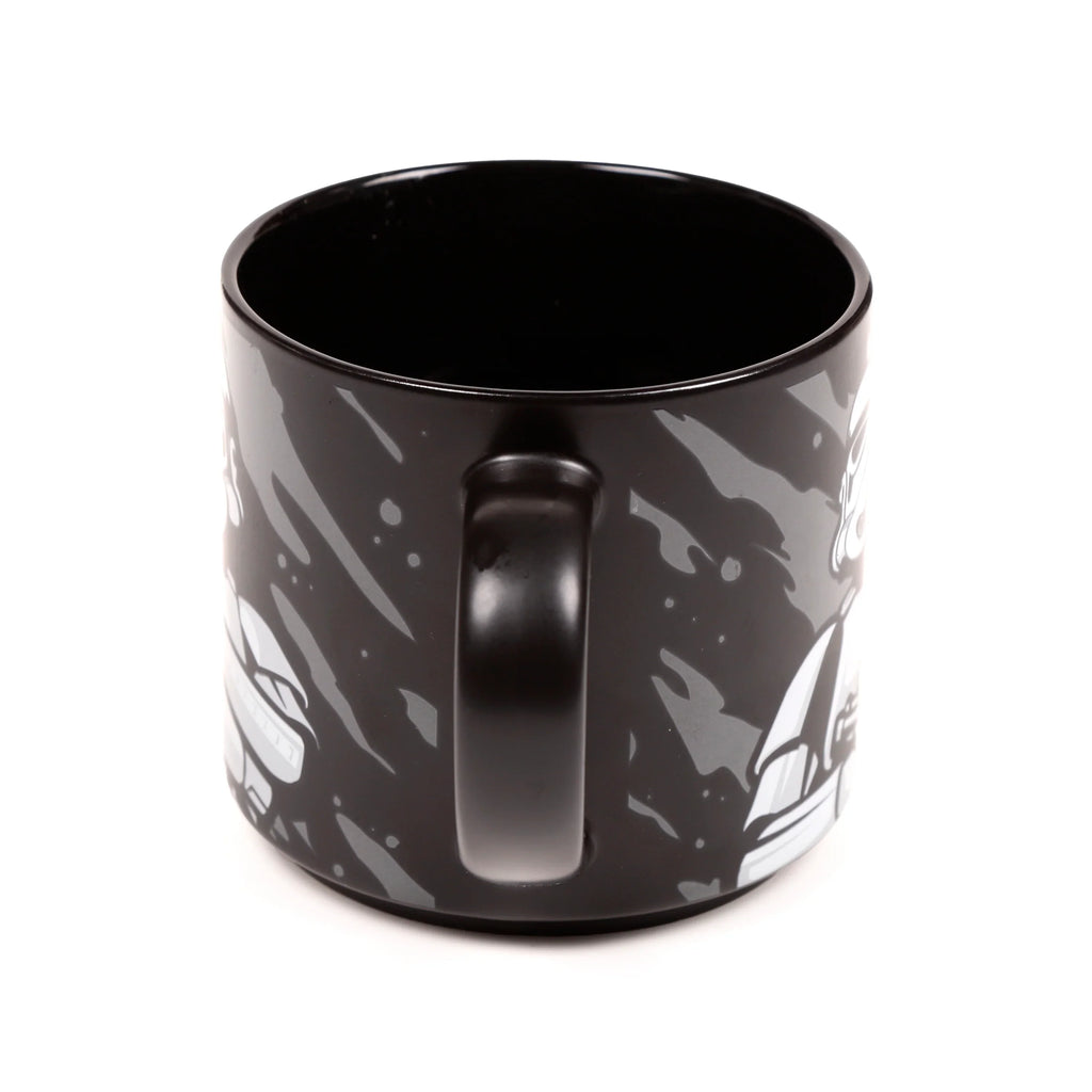 Angled view of a large black porcelain mug, featuring grey and white stylised Stormtrooper helmet designs and a prominent black handle.