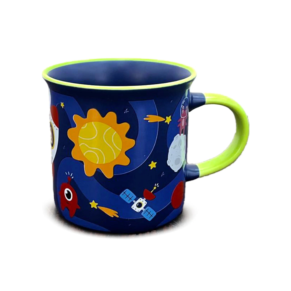 Angled view of a dark blue mug with a bright green handle and fine green rim, showcasing a colourful space theme with sun, rocket, moon, stars, and a satellite.