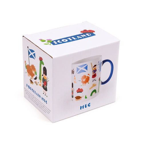 Angled view of a white cardboard box for a Scotland souvenir porcelain mug, decorated with colourful Scottish illustrations including a Highland cow, bagpiper, and the Scottish flag, with 'SCOTLAND' printed on the lid.