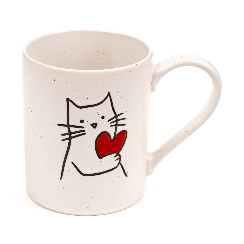 Angled view of an off-white speckled stoneware mug featuring a black line art cat holding a red heart, with the handle visible.