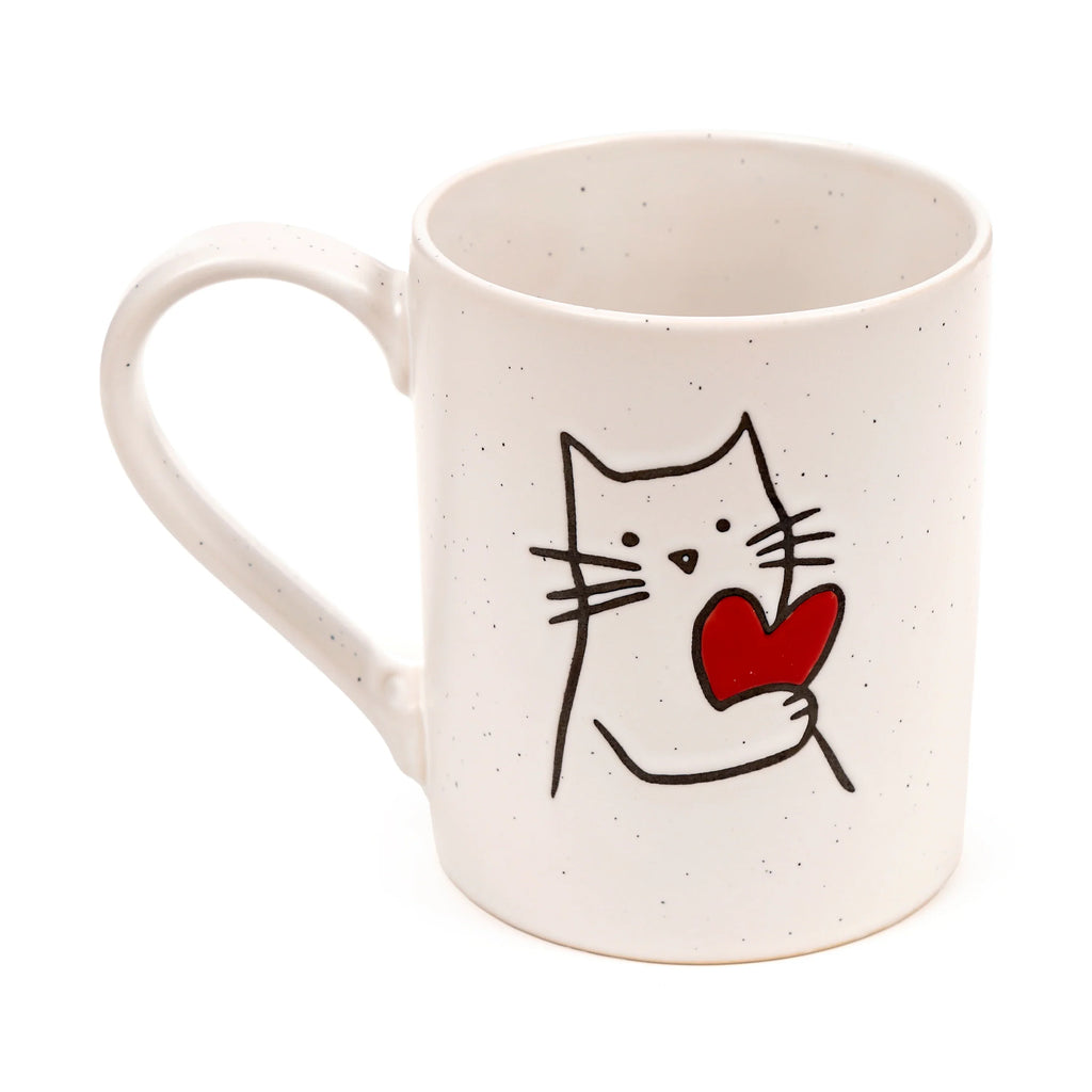 Front view of a cream speckled stoneware mug featuring a black outline cat holding a red heart.