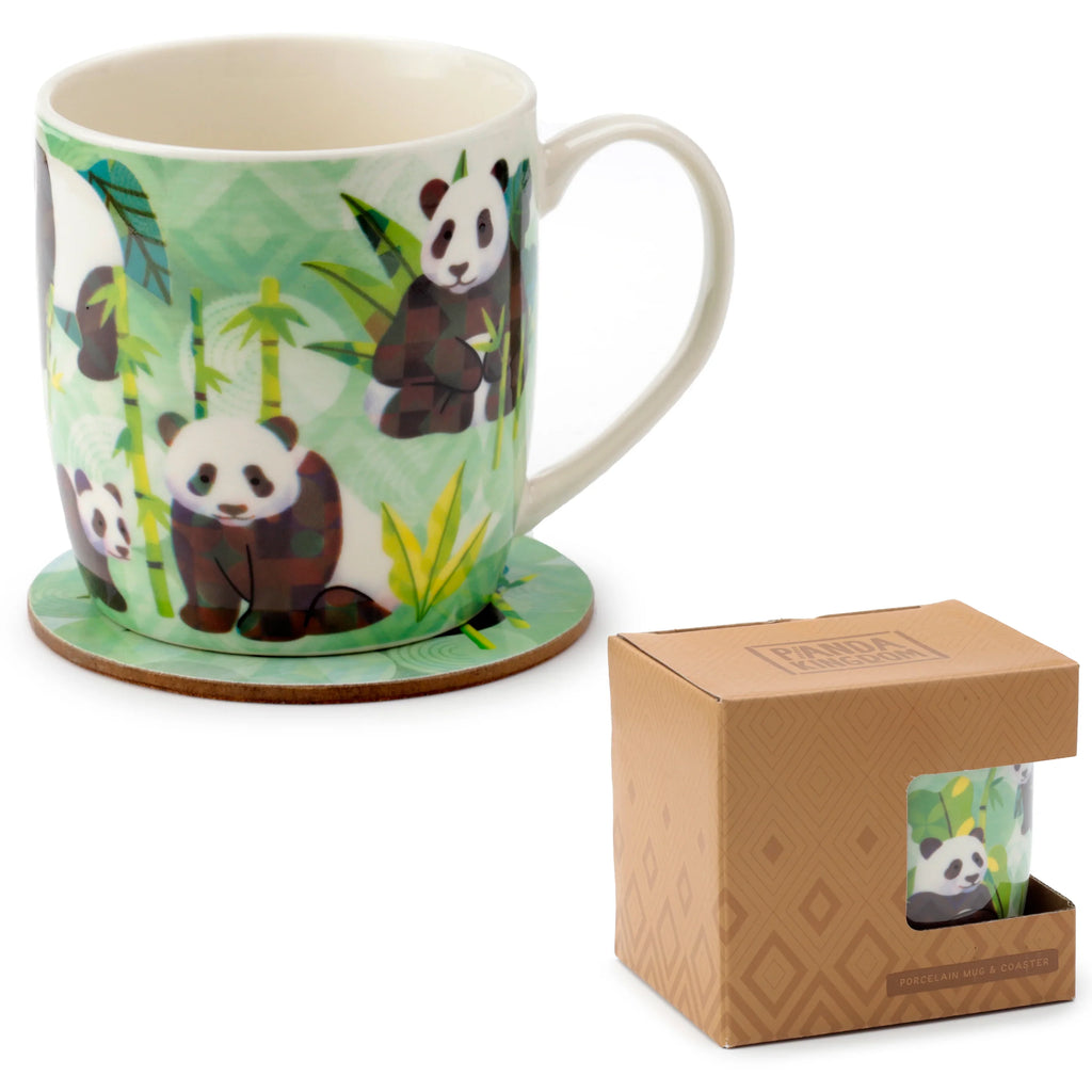Angled view of a porcelain mug and matching coaster set. The mug displays a green panda and bamboo pattern, sitting on its round coaster. A brown cardboard packaging box, labelled 'Porcelain Mug & Coaster' and featuring a window, is positioned alongside the set.