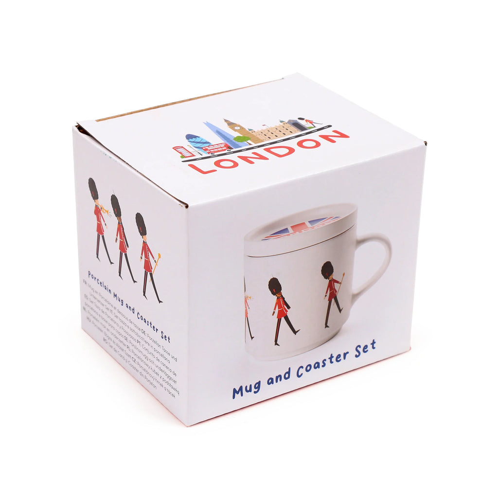 Angled view of a white cardboard box for a porcelain mug and coaster lid set, decorated with illustrations of London Guardsmen, a London skyline, and the word 'LONDON' in red.