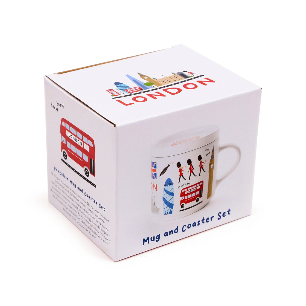Angled view of a white gift box for a porcelain mug and coaster set. The box features London-themed illustrations, including a skyline, a red double-decker bus, Big Ben, and Beefeaters, with 'LONDON' text on its panels.