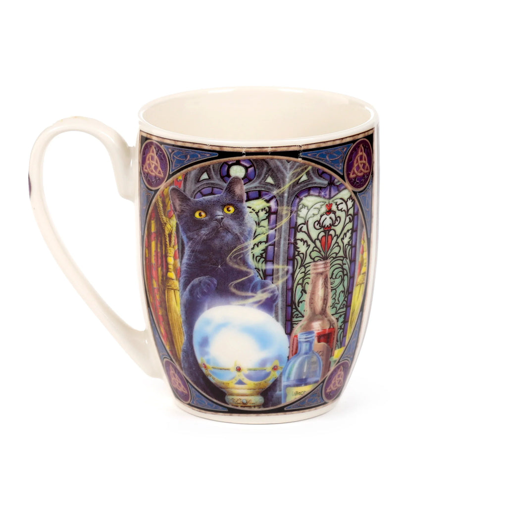 Front view of a porcelain mug featuring a black cat with yellow eyes gazing at a glowing crystal ball, set against a stained-glass window background with decorative borders.