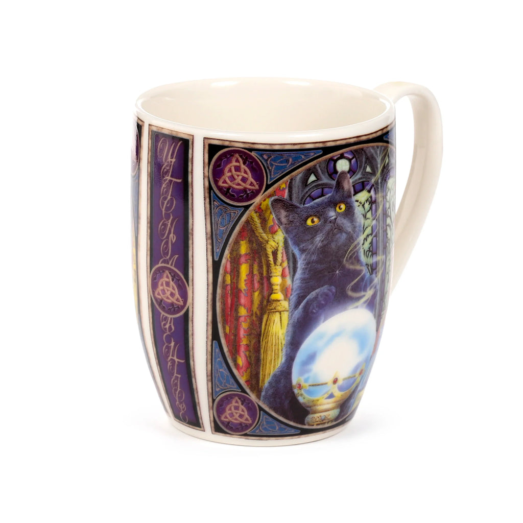 Angled view of a cream porcelain mug, featuring a detailed illustration of a black cat with yellow eyes gazing into a glowing crystal ball, bordered by purple panels with golden Celtic knot designs.