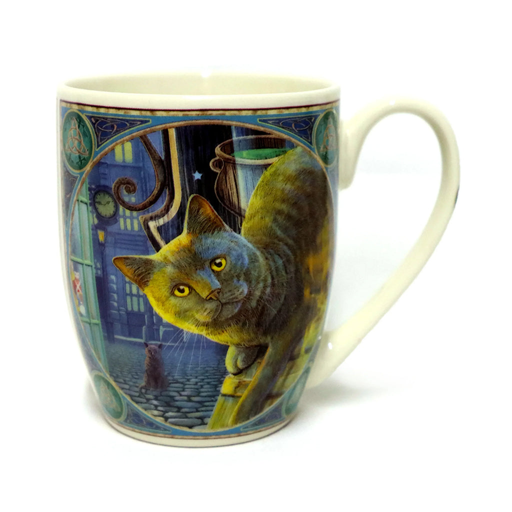 Front view of a cream-coloured porcelain mug, depicting a large dark cat with bright yellow eyes peeking from a dark, mystical street scene with a cauldron and a smaller cat, framed by decorative Celtic knotwork.