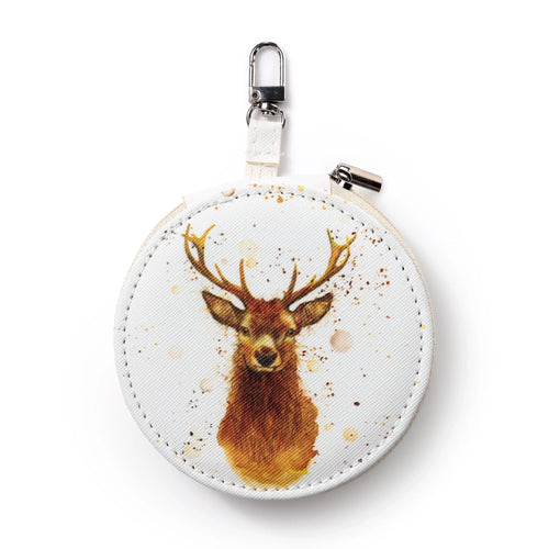 Front view of a round manicure set case featuring a Jan Pashley stag illustration, complete with a silver-coloured metal carabiner clip and a white zip.