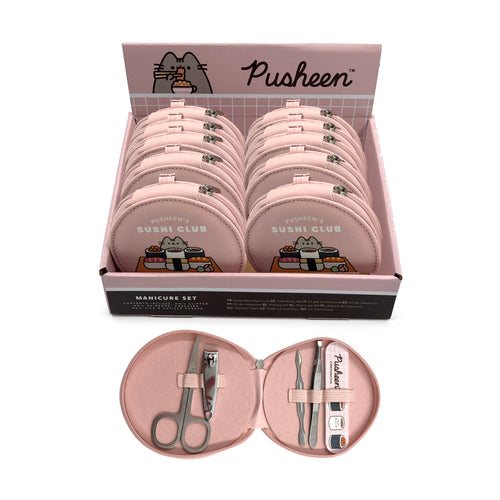 Angled view of a retail display box containing multiple closed pink Pusheen Sushi Club round manicure sets, with one open set revealing nail clippers, scissors, tweezers, a nail file, and a cuticle pusher.