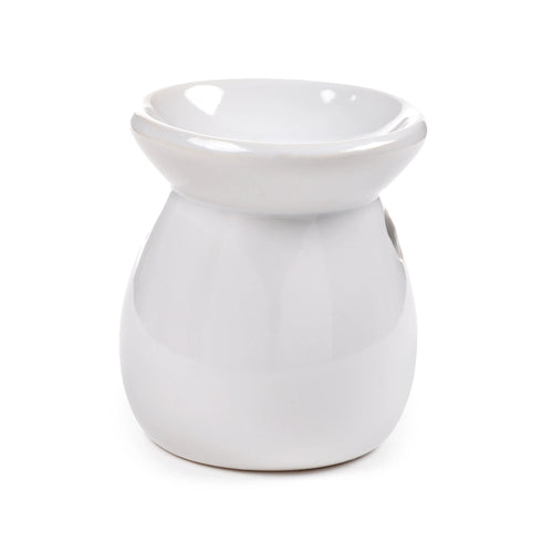 Angled view of a plain white ceramic oil burner, featuring a smooth, rounded body and a shallow dish at the top.