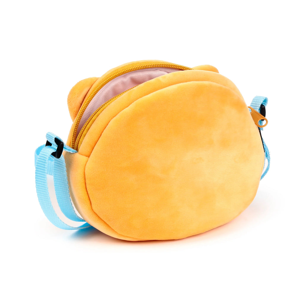 Angled view of an orange plush cross-body bag with a light blue strap, featuring a partially open yellow zip and pink interior lining.