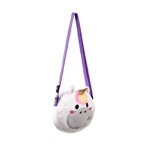 Angled view of a white plush unicorn crossbody bag, with a golden horn, rainbow fringe, pink ears, grey snout, and a purple adjustable strap.