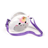Plush white unicorn cross body bag featuring a gold horn, rainbow detail, black eyes, pink cheeks, and a grey snout. The bag is shown at an angle with a purple strap and a partially open top zipper.