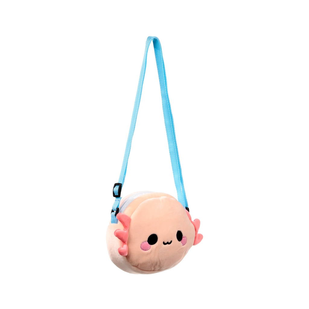 Front view of a pale pink plush axolotl crossbody bag, featuring pink gills, black eyes, pink cheek blushes, a small black mouth, and a light blue adjustable strap.