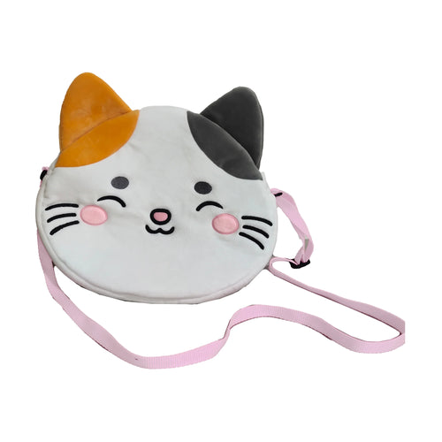 Front view of the Lola the Cat plush crossbody bag, featuring a white cat face with one ginger ear and one grey ear, embroidered details, and a pink strap.