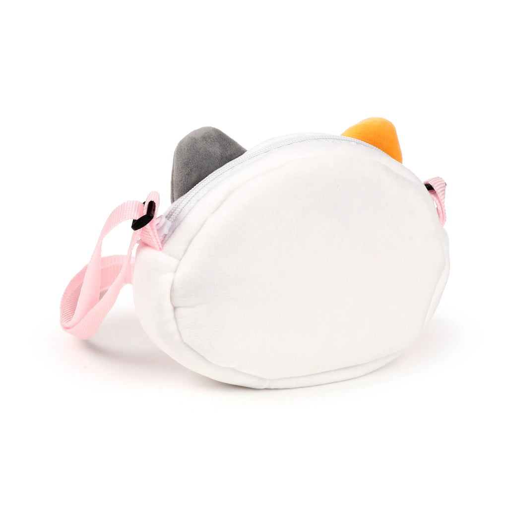 Angled view of a white plush Lola the Cat crossbody bag, featuring distinct grey and orange cat ears, a white zip closure, and a pink fabric strap.