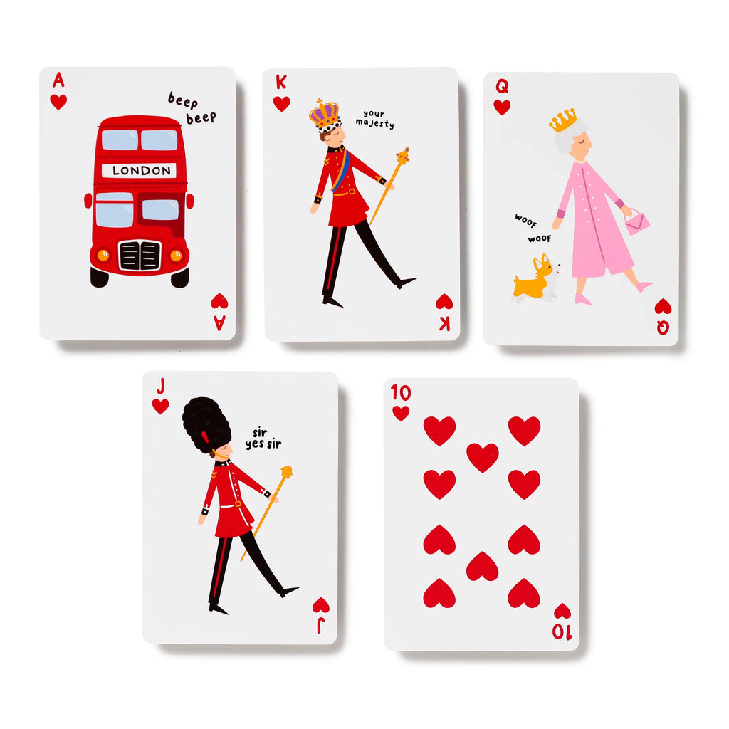 Five London souvenir playing cards displayed, featuring unique illustrations: a red double-decker bus on the Ace of Hearts, a monarch on the King of Hearts, a Queen with a corgi on the Queen of Hearts, a Royal Guard on the Jack of Hearts, and red heart pips on the Ten of Hearts.