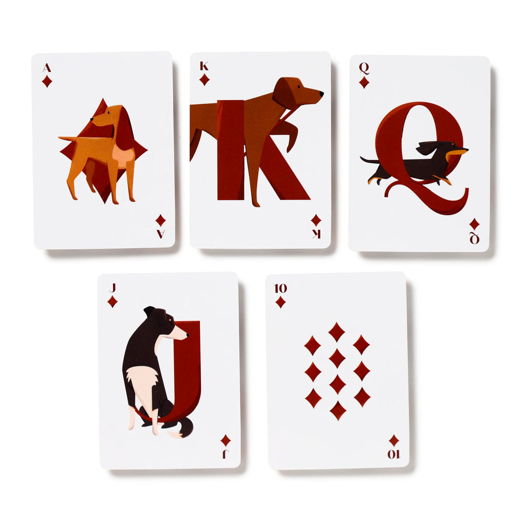 Five Barks Dog playing cards, including the Ace, King, Queen, Jack, and Ten of Diamonds, shown from above, each card featuring a unique dog illustration.