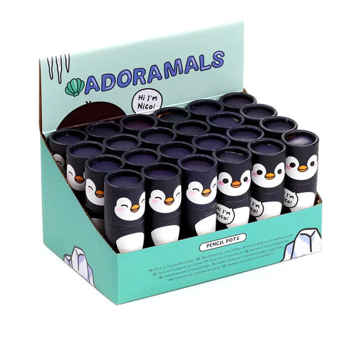 Angled view of a mint green retail display box, labelled 'ADORAMALS' and 'PENCIL POTS', filled with numerous dark and white colouring pencil tubes, each decorated with a cartoon penguin design. The box features multi-language text and iceberg graphics.