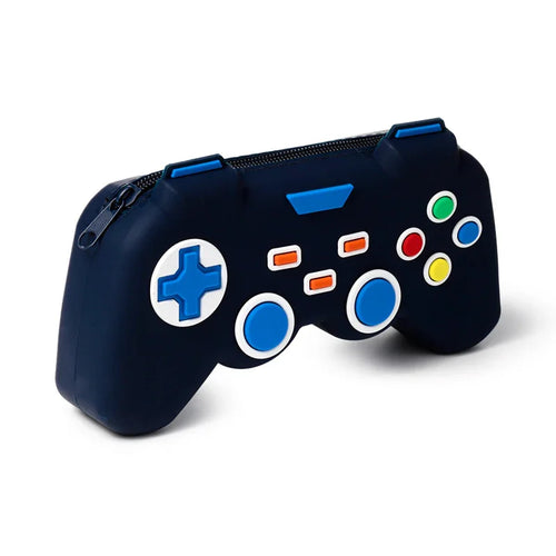 Angled view of a dark blue silicone pencil case shaped like a game controller, featuring a blue D-pad, orange rectangular buttons, and assorted green, red, yellow, and blue circular buttons, with a black zip closure across the top.