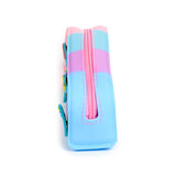 Angled view of a silicone pencil case with blue, pink, and purple colour bands, featuring a pink zip along the top and unicorn, rainbow, star, and cloud charms along its side.
