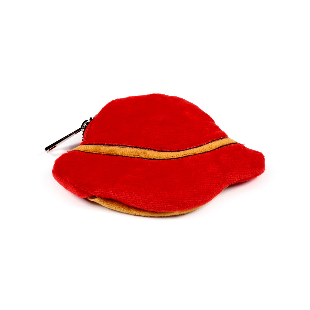 Angled view of a red plush hat-shaped change purse, featuring a yellow trim and a black zip.
