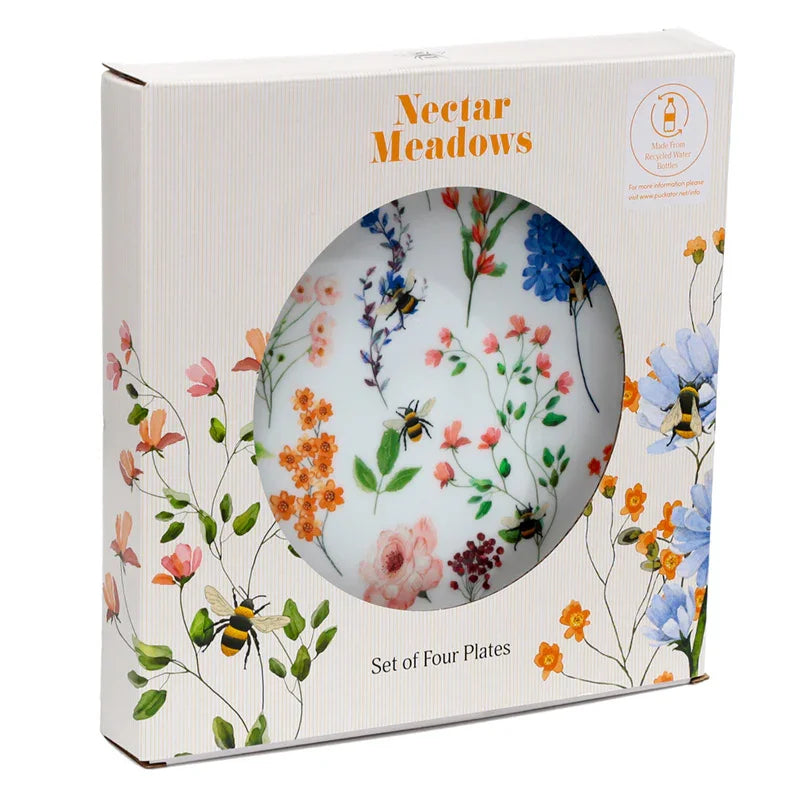 Angled view of a Recycled RPET Set of 4 Picnic Plates in a light-coloured box. The box, with its Nectar Meadows floral and bee design, highlights that it's made from recycled water bottles, and a circular cutout reveals one plate with a matching colourful floral and bee pattern.