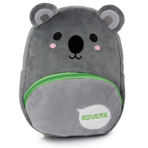 Front view of a grey plush koala rucksack backpack with embroidered facial features, pink cheek details, and a bright green zipped front pocket incorporating a white speech bubble patch.