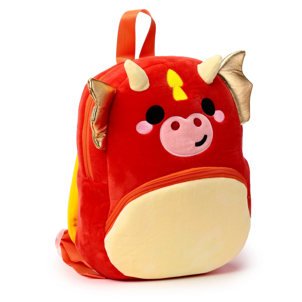 Front view of a red plush dragon kids school backpack with gold wings, light horns, and a zippered front pocket.