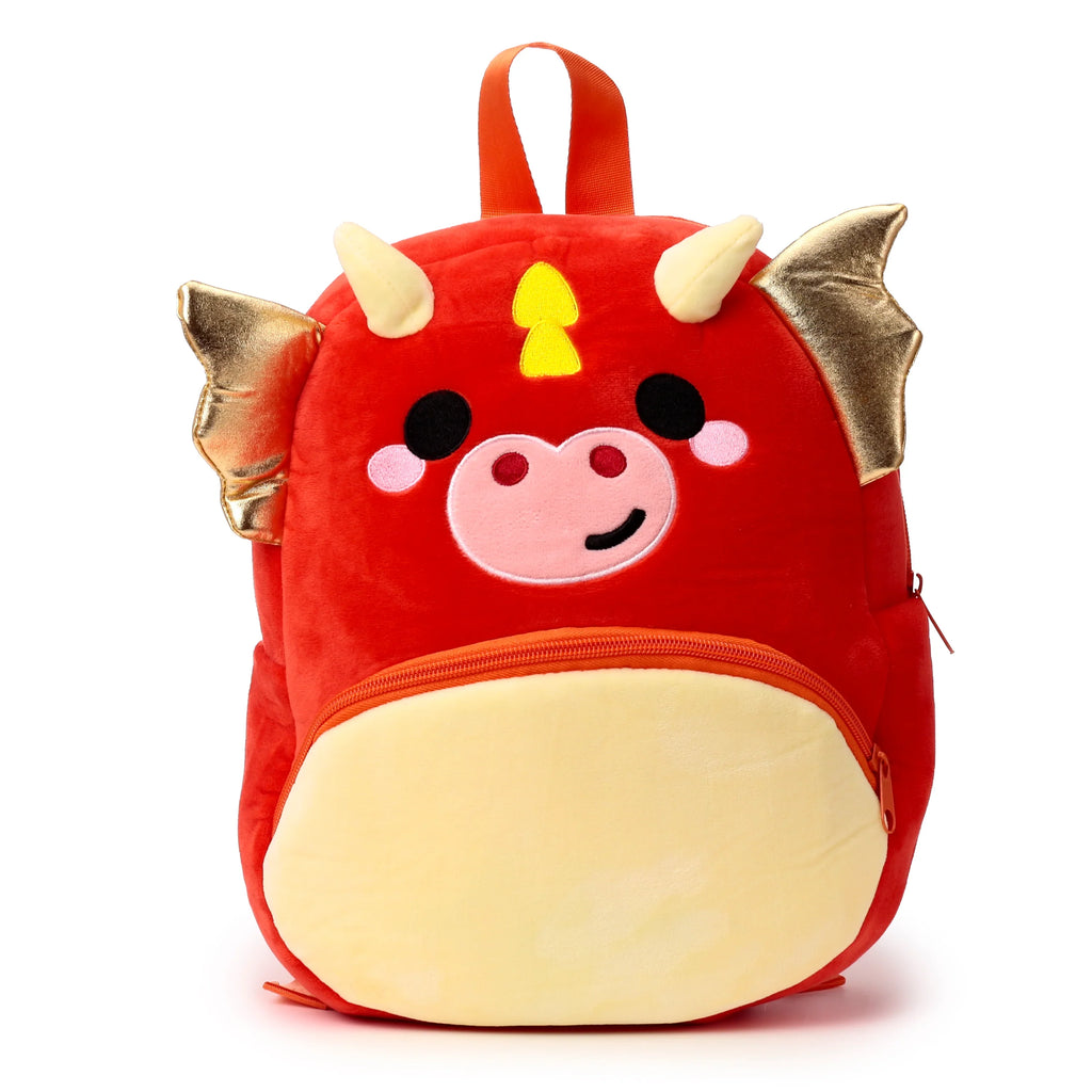 Front view of a red kids' school rucksack, designed as a dragon with golden wings, horns, and an embroidered face, featuring a yellow front pocket.