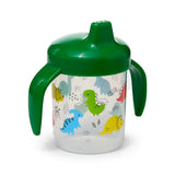 Angled view of a reusable shatterproof sippy cup with a clear body, featuring a colourful cartoon dinosaur pattern. It has a dark green lid with an integrated spout and matching handles.