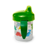 Angled view of a clear sippy cup with a bright green lid and an integrated handle, decorated with colourful dinosaur illustrations.