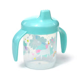 Angled view of a clear plastic sippy cup with colourful unicorn, rainbow, star, and heart patterns, and a turquoise lid featuring a spout and two handles.