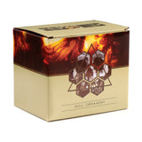 Angled view of a beige and brown product box for a 'Multiple Skulls Head Decoration' figurine. The front features a hexagonal skull graphic over an orange flame pattern, with 'SKULL ORNAMENT' text.