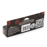 Angled view of the reverse of black dice set packaging, decorated with a red rose pattern. The packaging displays a barcode, QR code, and a recycling symbol.