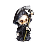 Front view of a decorative grim reaper skull ornament, wearing a black hooded cloak and holding a scythe with skull details.