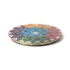 Angled view of a carved soapstone incense burner dish featuring a rainbow-coloured iridescent chakra lotus design.