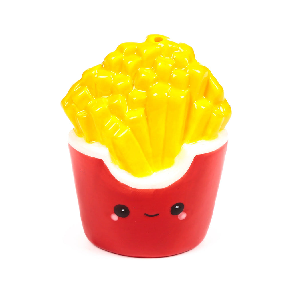 Front view of a ceramic chips salt or pepper shaker, with yellow chips in a red carton featuring a cute, smiling face.