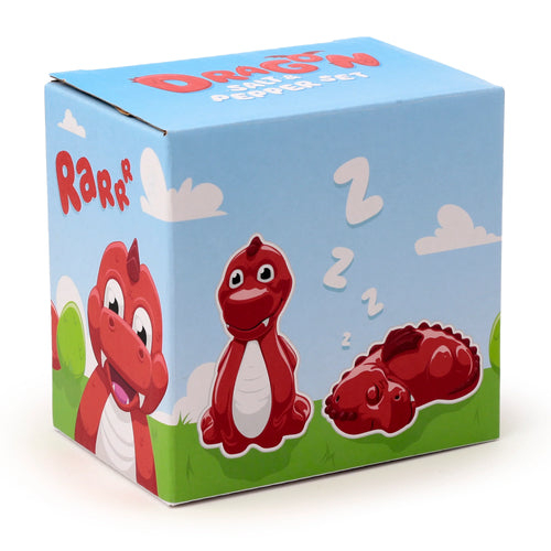 Angled view of a light blue and green cardboard box for a Novelty Ceramic Red Dragon Salt and Pepper Set. The front features cartoon illustrations of three red dragons – one roaring, one standing, and one sleeping, with 'Rarrr' text, and 'DRAGON SALT & PEPPER SET' on the top.