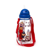 Angled view of a clear children's water bottle with a blue lid, white pop-up straw, and a red fabric strap. The bottle features London-themed illustrations of a sloth on a red double-decker bus, a monkey police officer, and a beefeater animal with Union Jack bunting.