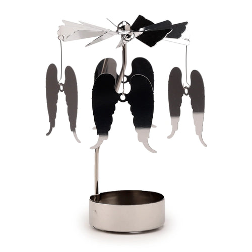 Silver-coloured metallic spinning tea light carousel candle holder, clearly displaying its four hanging angel wing charms and top fan mechanism.