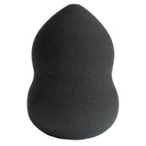 Black teardrop-shaped makeup beauty blender applicator sponge with a porous texture.