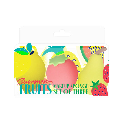 Front view of three summer fruits makeup sponges in a clear box. The set includes two yellow pear-shaped sponges and one red apple sponge with a green stem. The packaging has vibrant fruit illustrations.