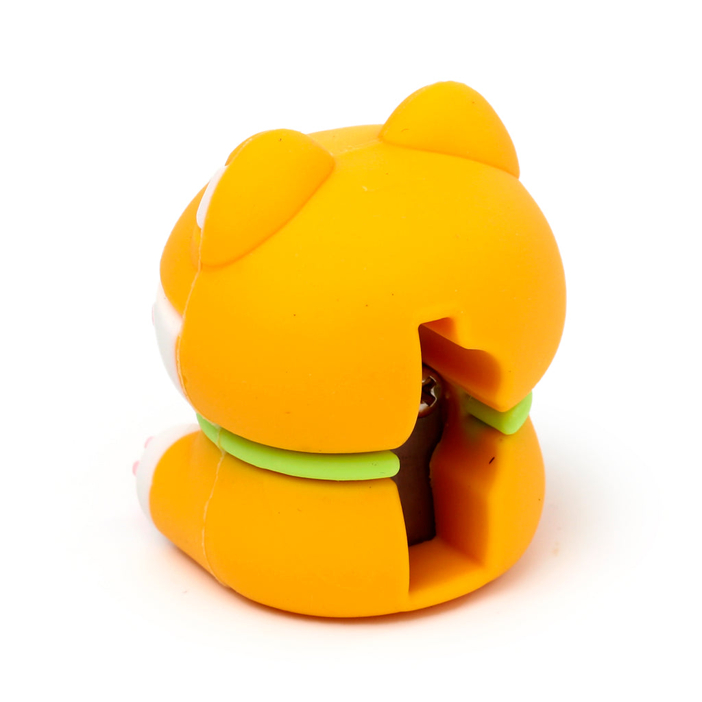 Angled view of an orange, white, and green Shiba Inu dog 2-in-1 sharpener and eraser, showing the sharpener mechanism.